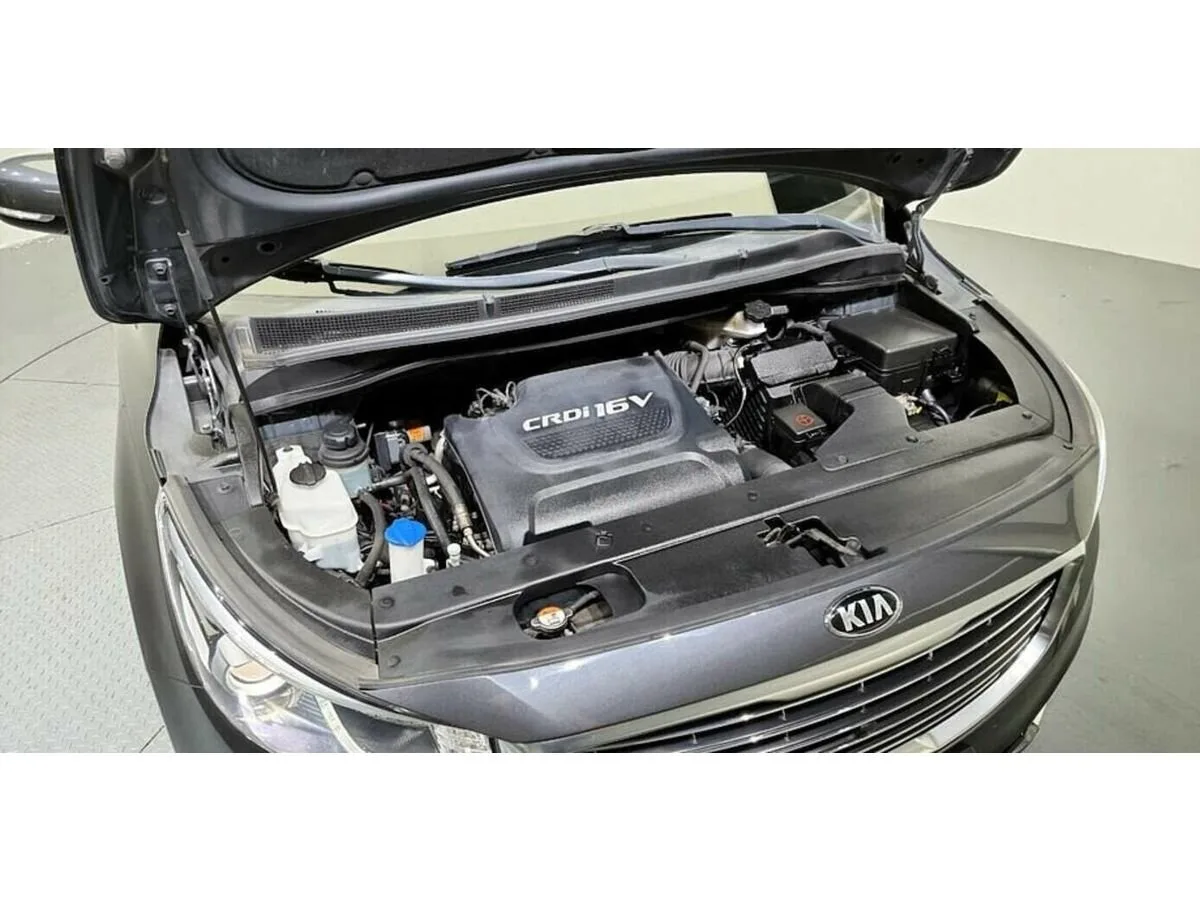 Kia Carnival III — фото 5