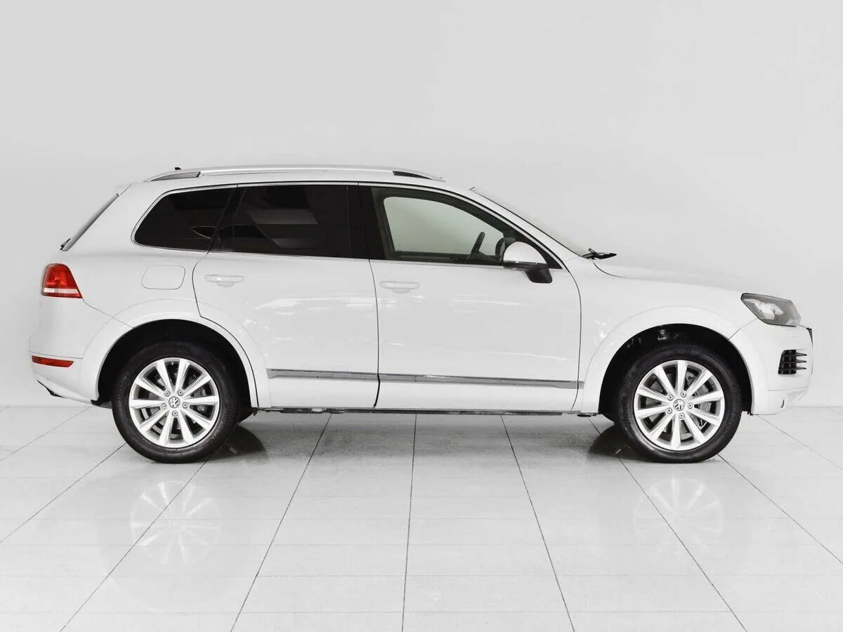 Volkswagen Touareg II · V8 TDI — фото 4