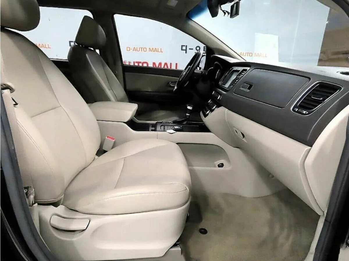 Kia Carnival III — фото 5