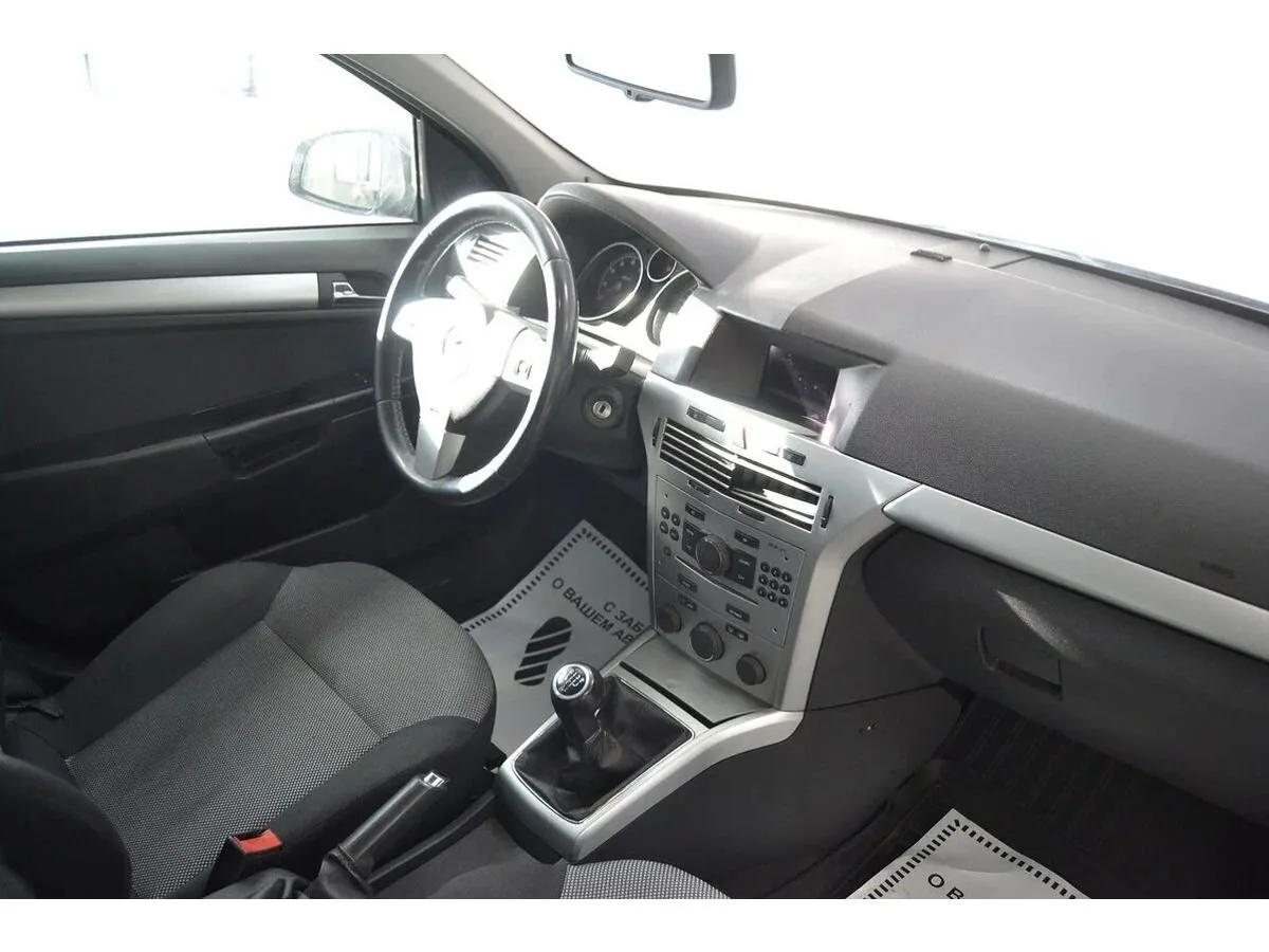 Opel Astra H Рестайлинг · Essentia — фото 5