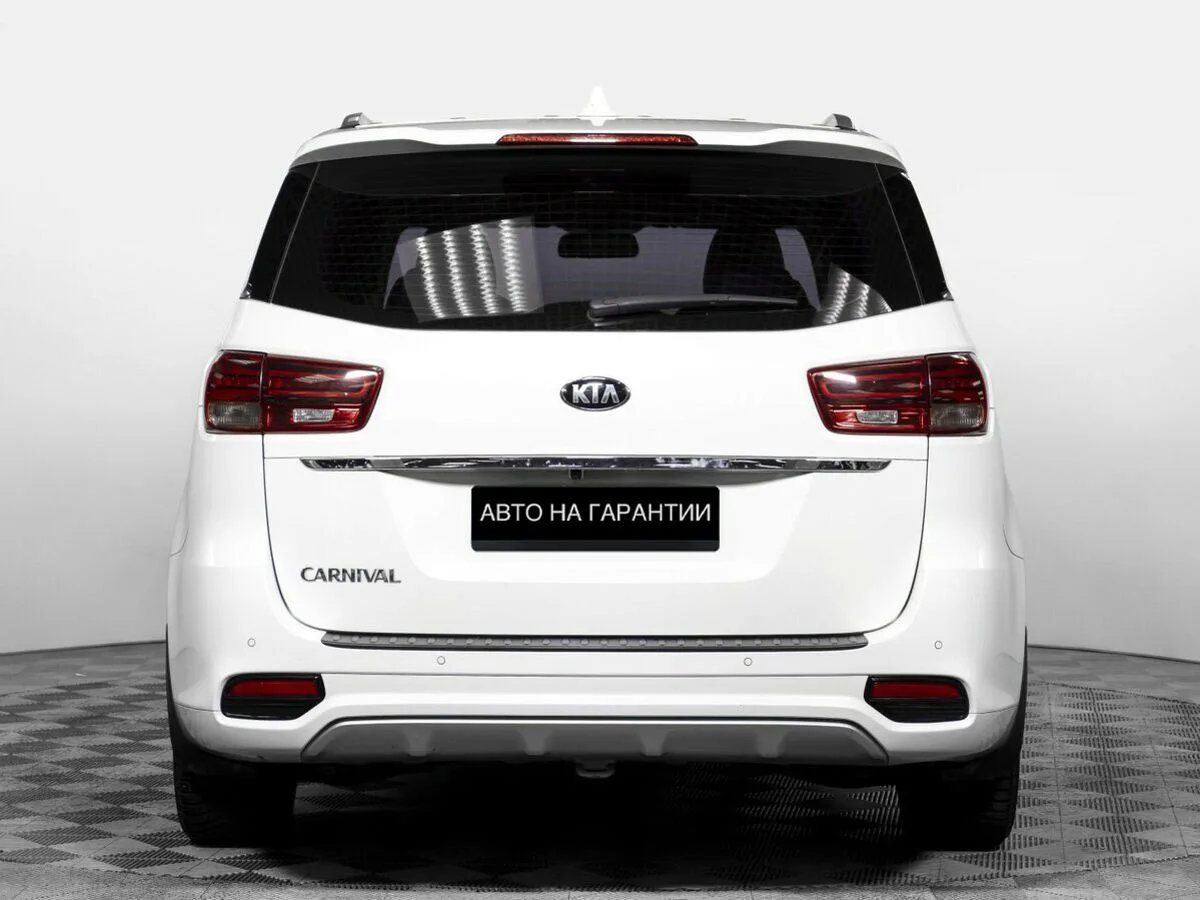 Kia Carnival III — фото 4