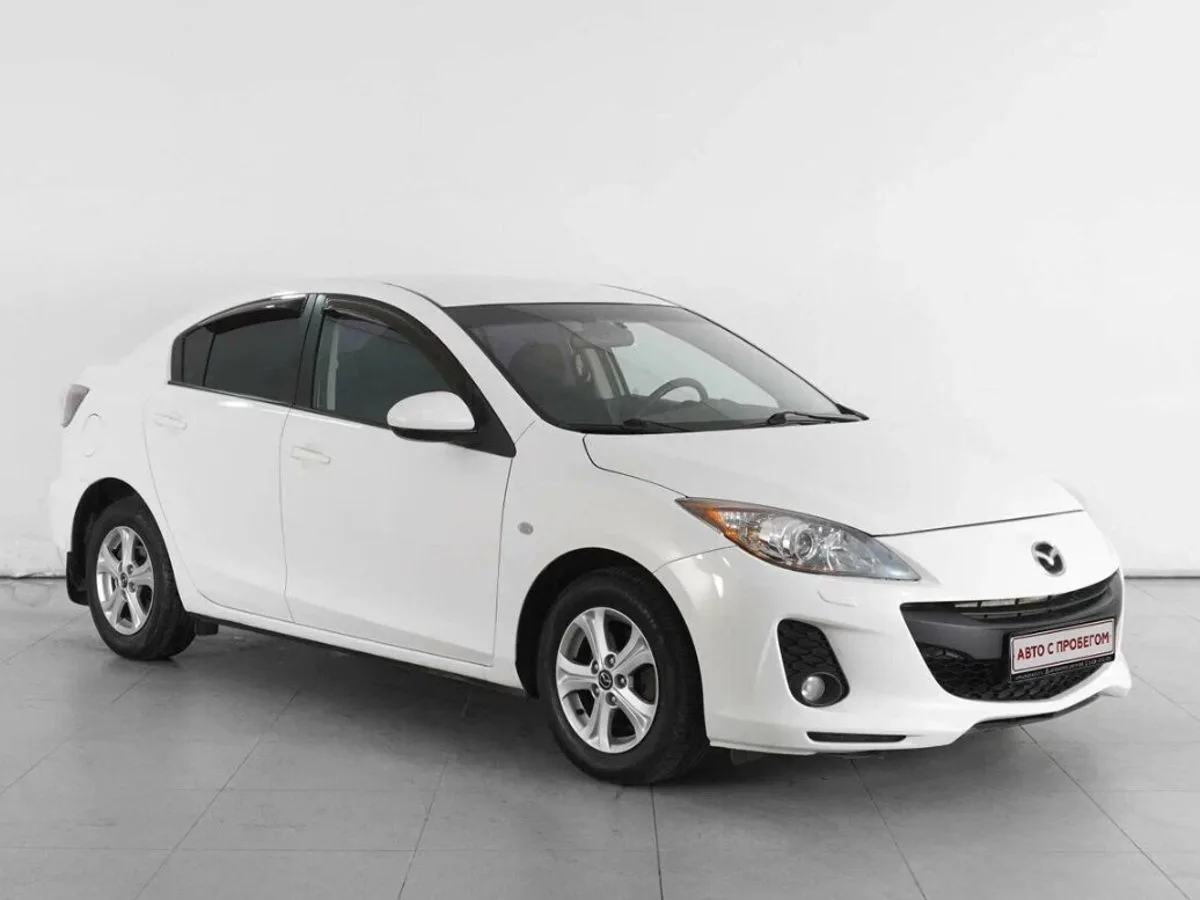 Mazda 3 II (BL) Рестайлинг · Touring Plus
