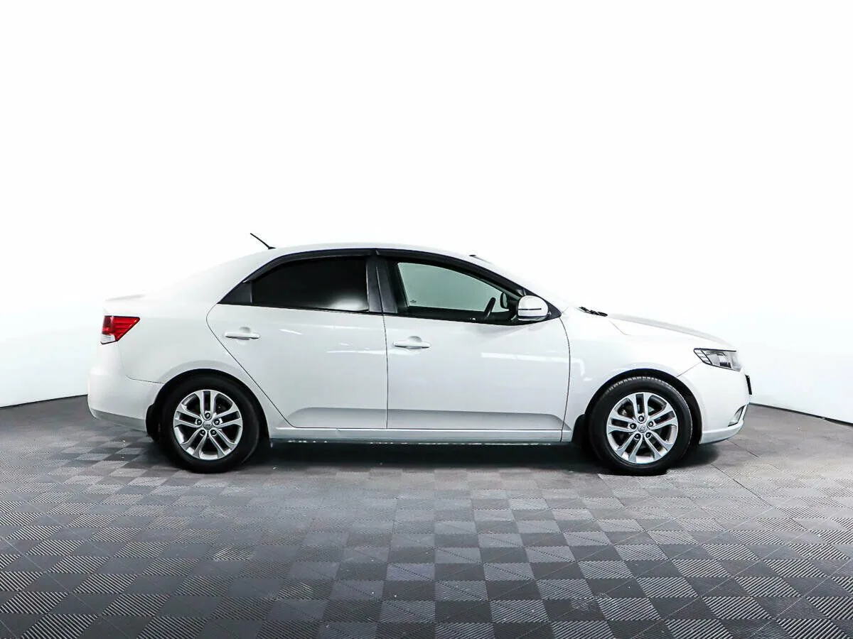 Kia Cerato II — фото 4