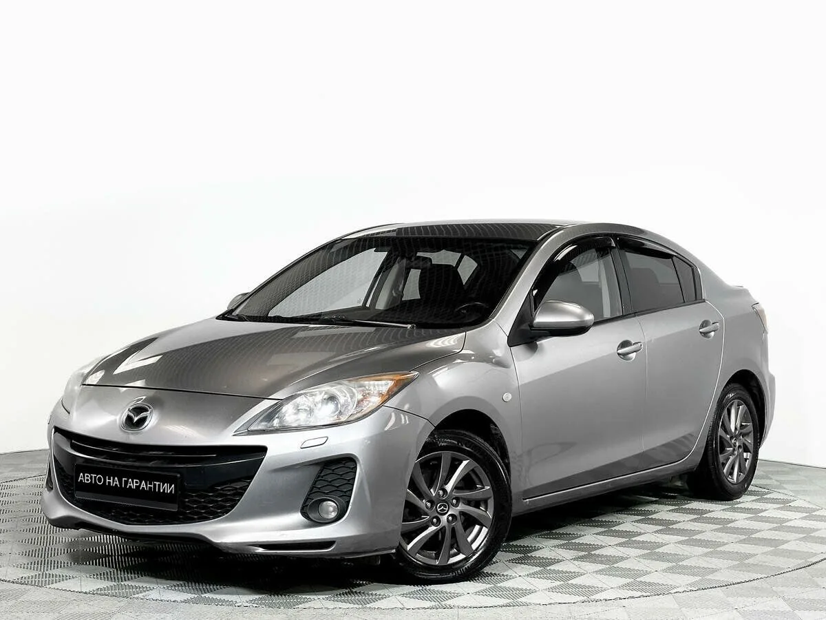 Mazda 3 II (BL) Рестайлинг · Touring
