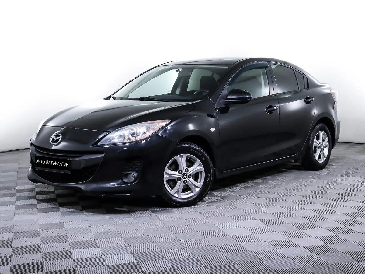 Mazda 3 II (BL) Рестайлинг · Touring Plus