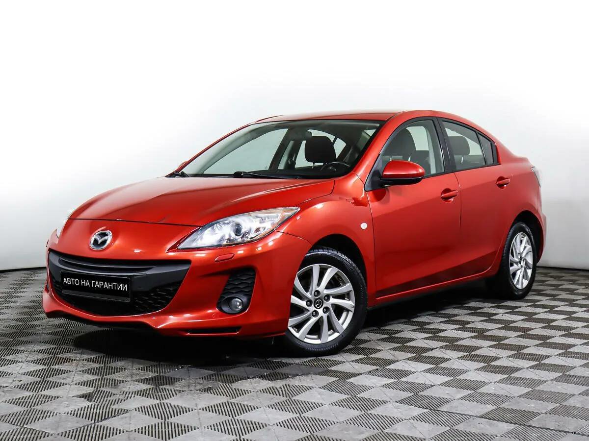 Mazda 3 II (BL) Рестайлинг · Touring Plus