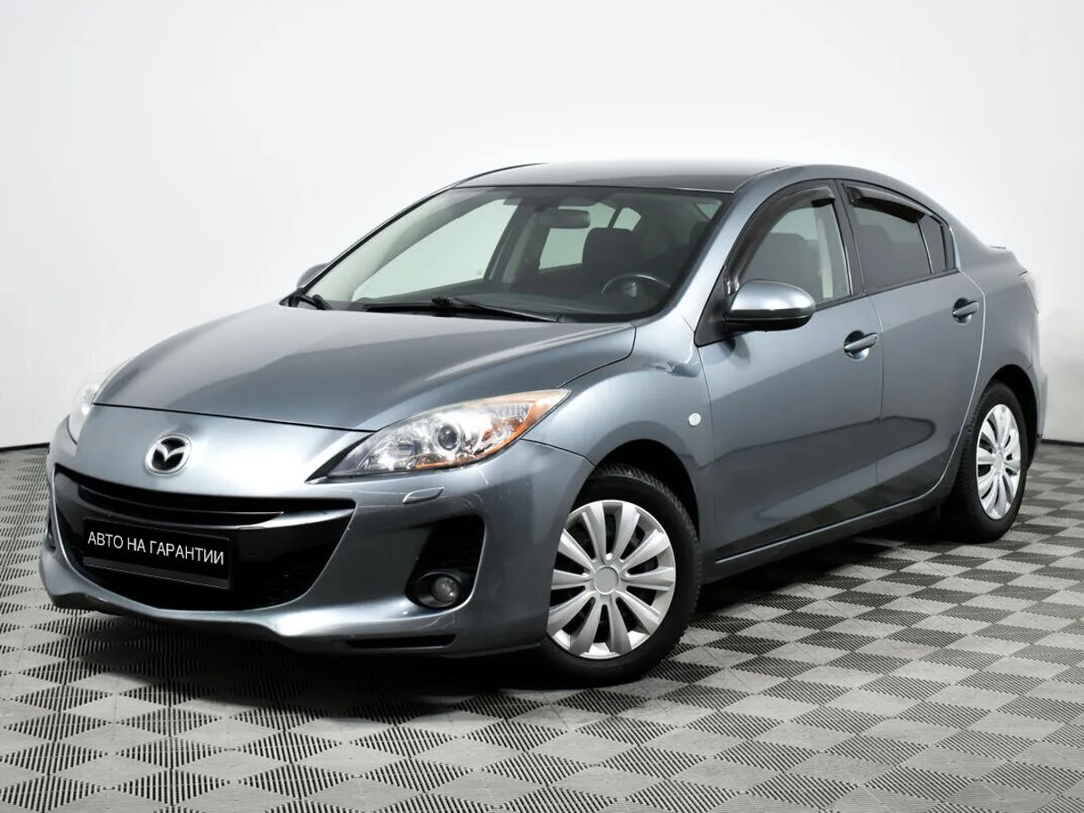 Mazda 3 II (BL) Рестайлинг · Touring