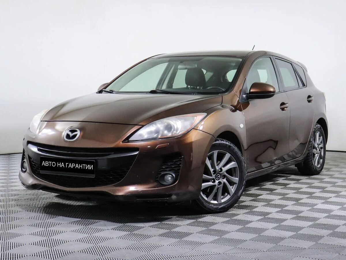 Mazda 3 II (BL) Рестайлинг · Touring Plus