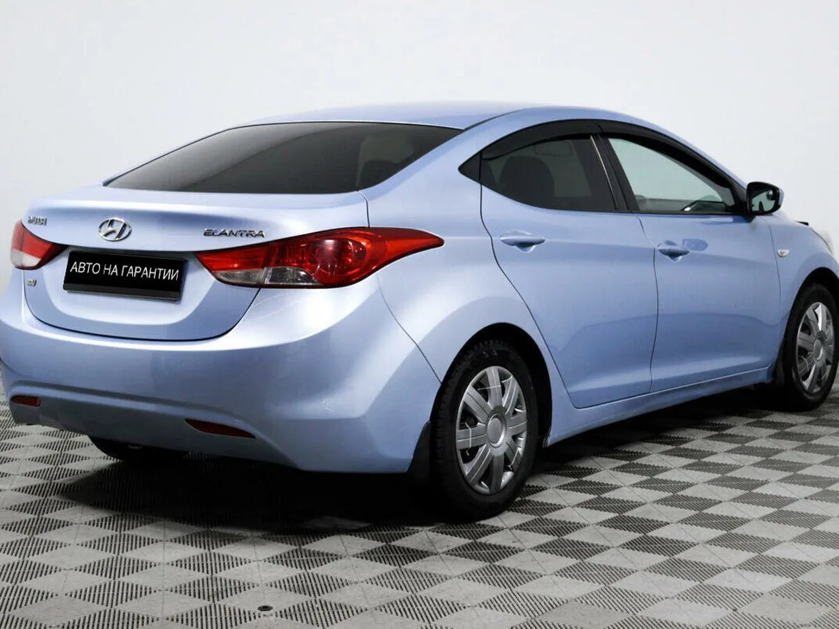 Hyundai Elantra V (MD) · Optima — фото 5
