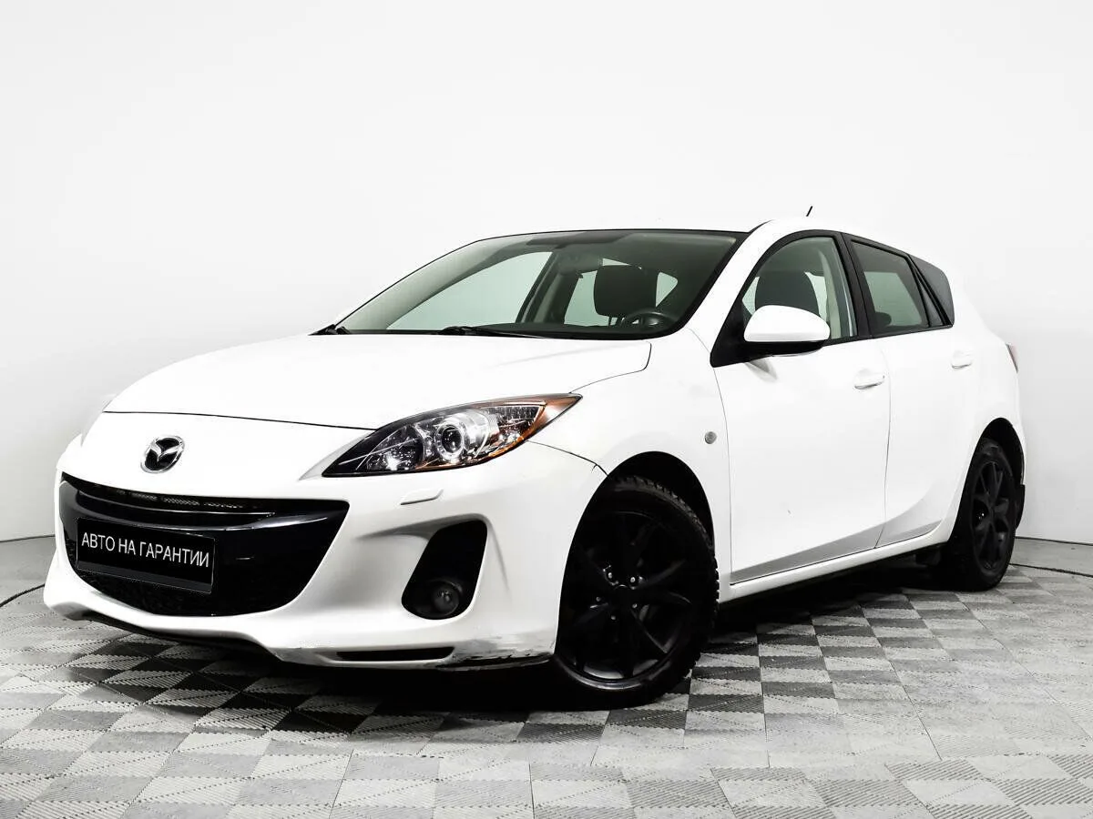Mazda 3 II (BL) Рестайлинг · Touring Plus