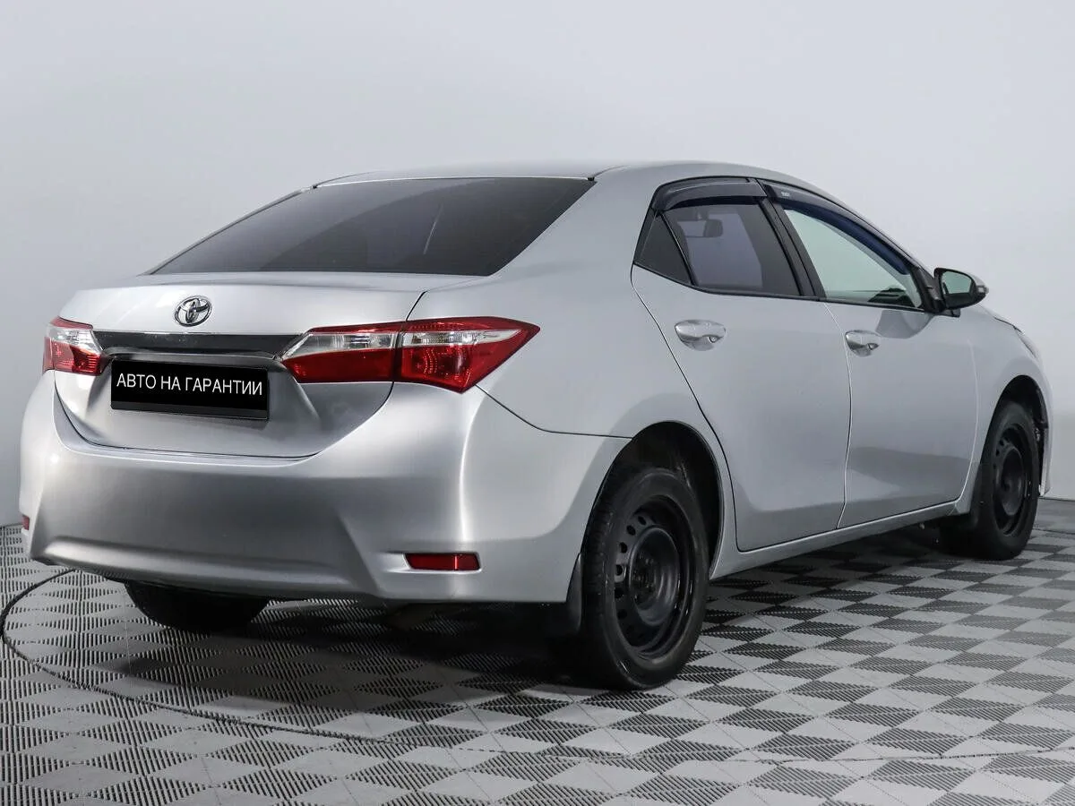 Toyota Corolla XI (E160, E170, E180) · Классик — фото 4