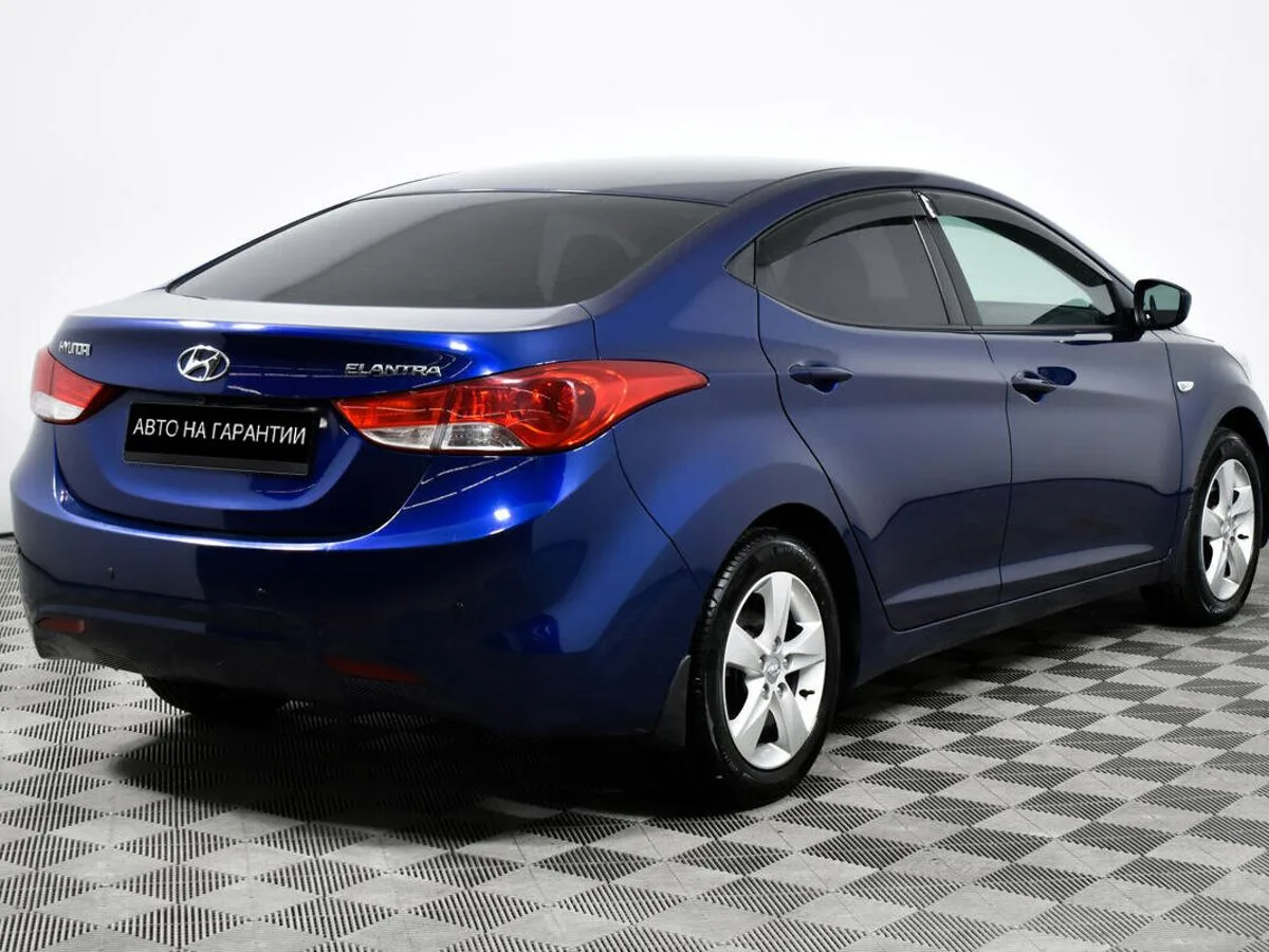 Hyundai Elantra V (MD) · Optima — фото 5