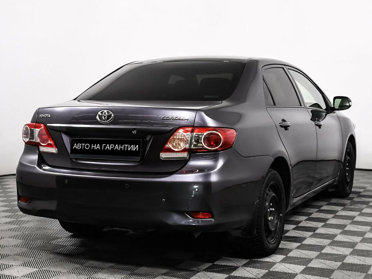 Toyota Corolla X (E140, E150) Рестайлинг · Элеганс — фото 5