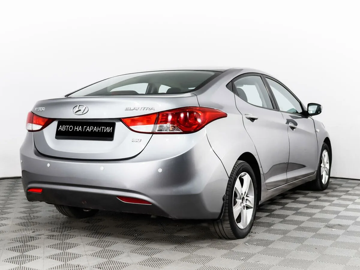 Hyundai Elantra V (MD) · Optima — фото 5