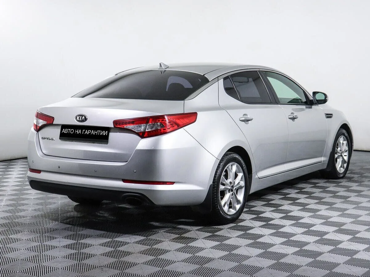 Kia Optima III · Prestige — фото 3