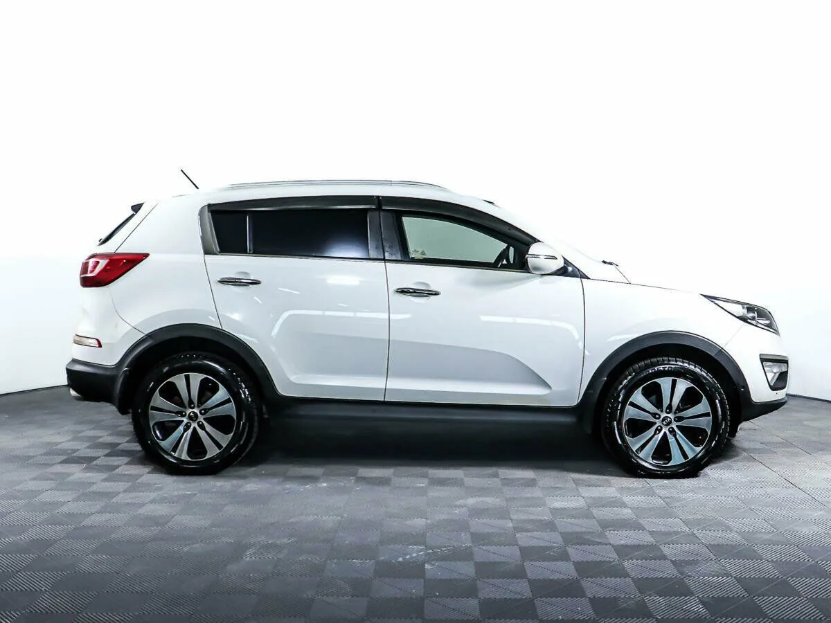 Kia Sportage III — фото 4