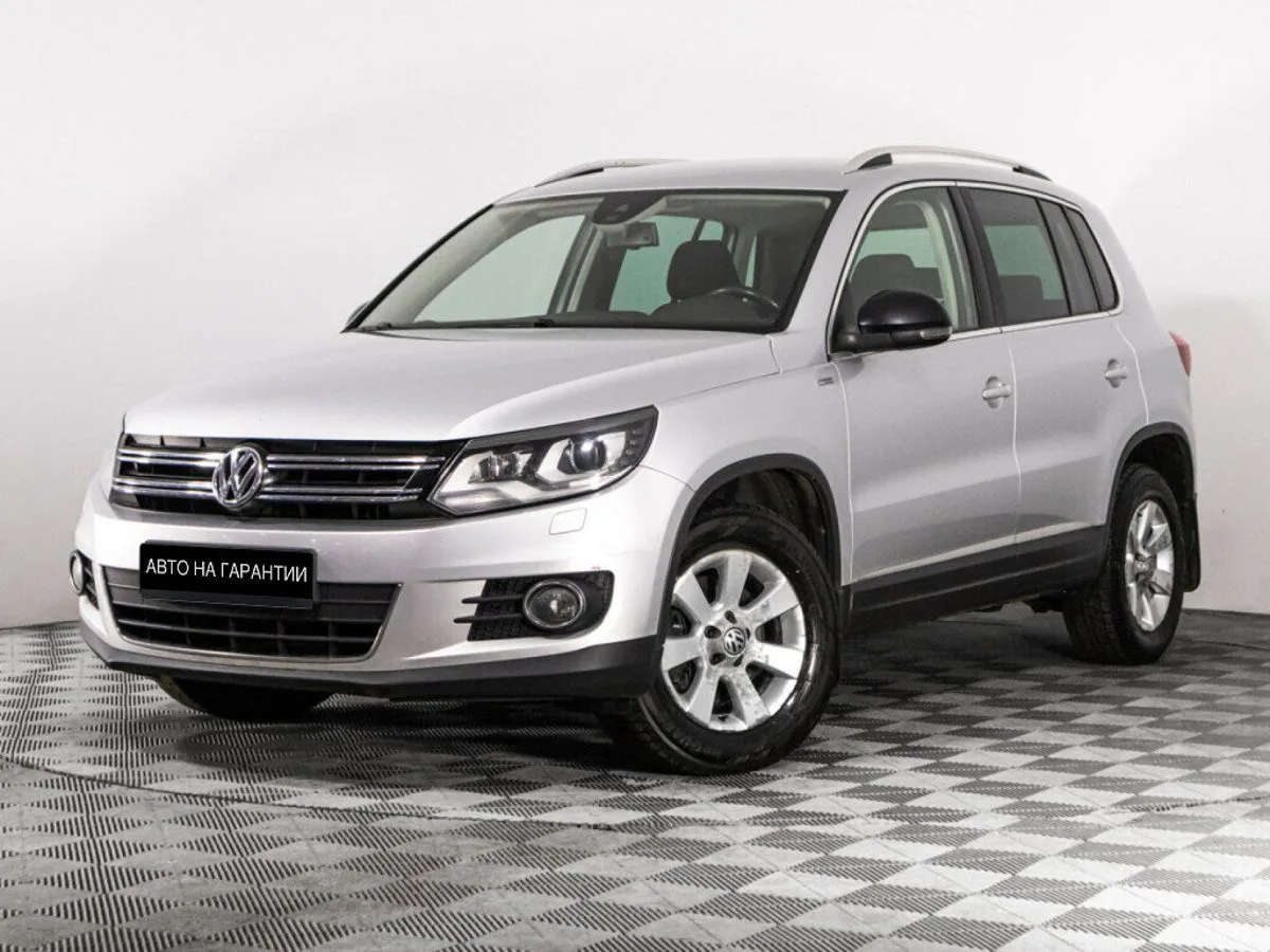 Volkswagen Tiguan I Рестайлинг · Adventure