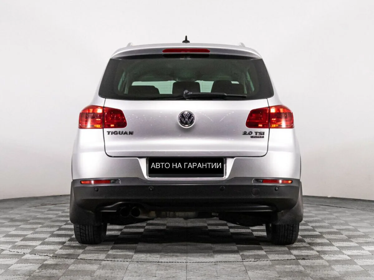 Volkswagen Tiguan I Рестайлинг · Adventure — фото 4