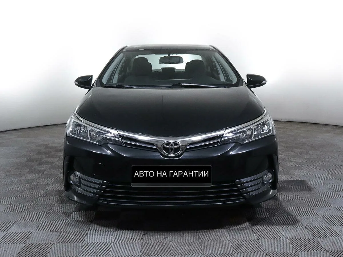 Toyota Corolla XI (E160, E170, E180) Рестайлинг 1 · Комфорт — фото 2