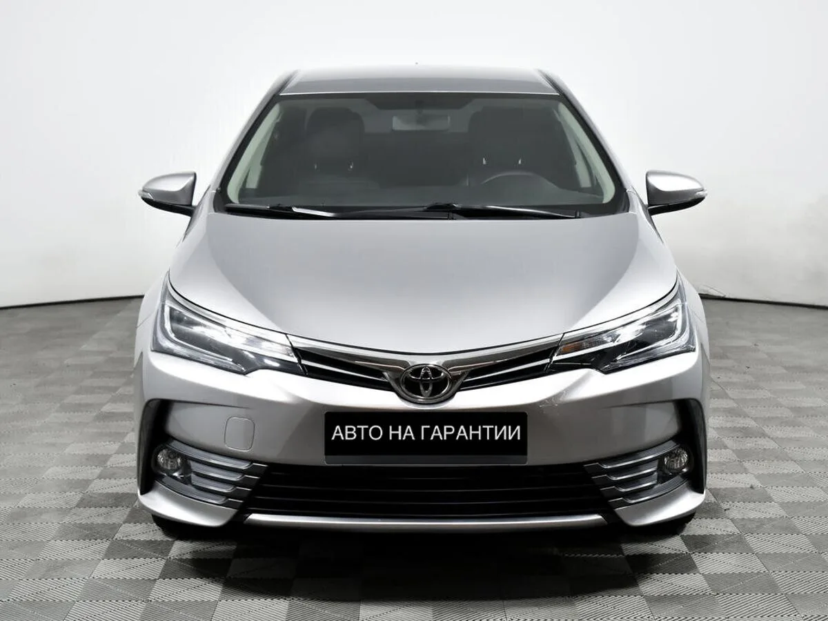 Toyota Corolla XI (E160, E170, E180) Рестайлинг 1 · Стиль — фото 2