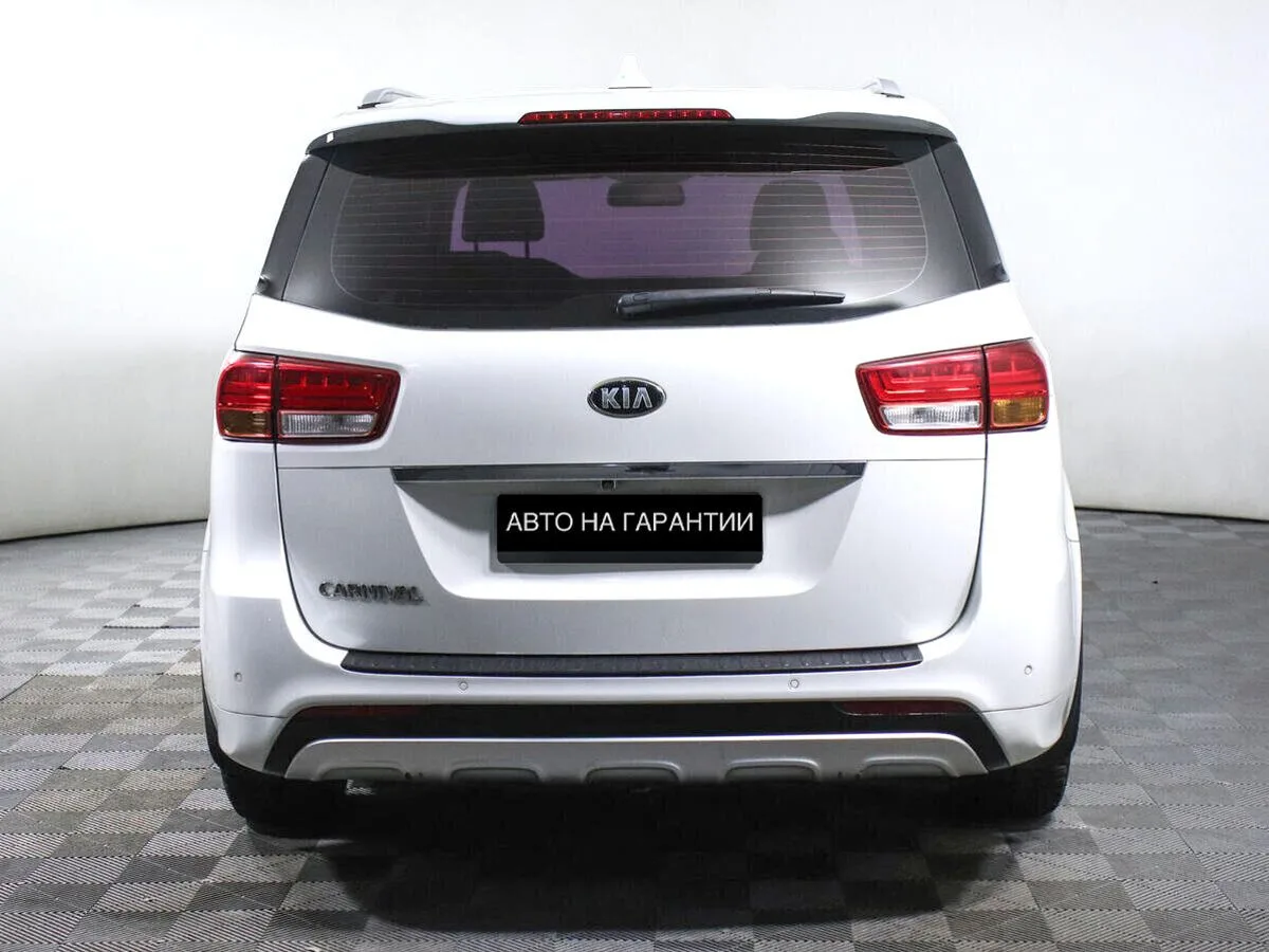 Kia Carnival III — фото 4