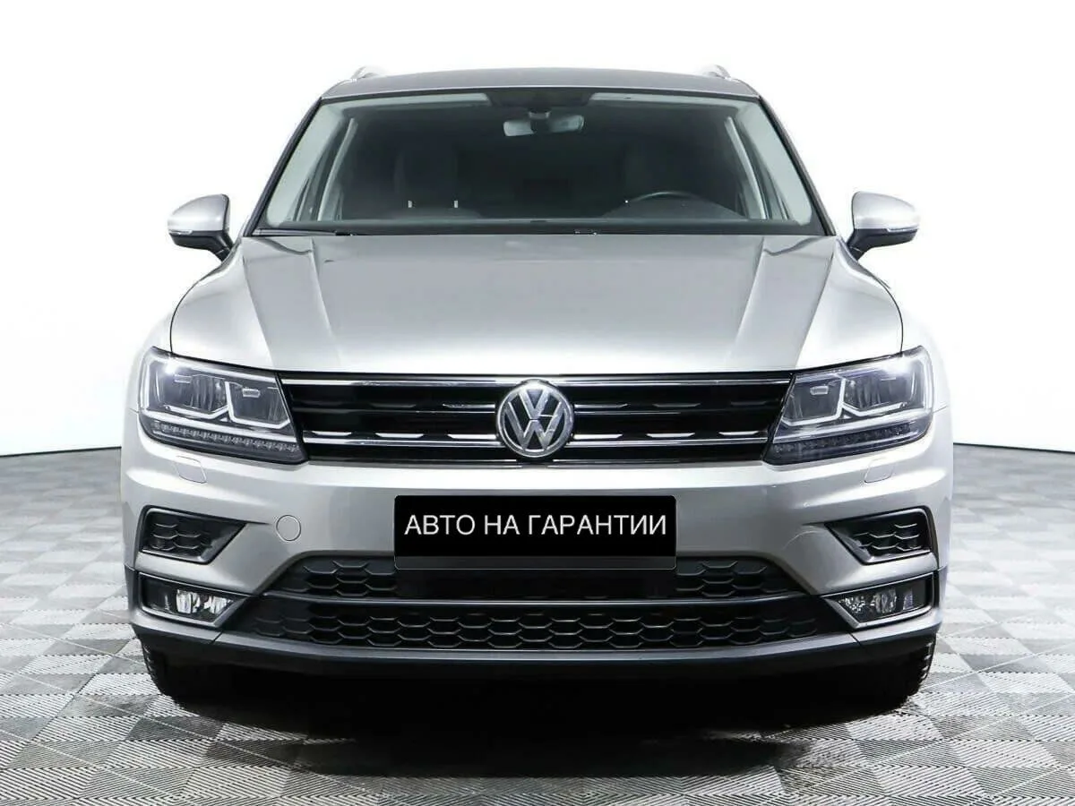 Volkswagen Tiguan II · Highline — фото 2