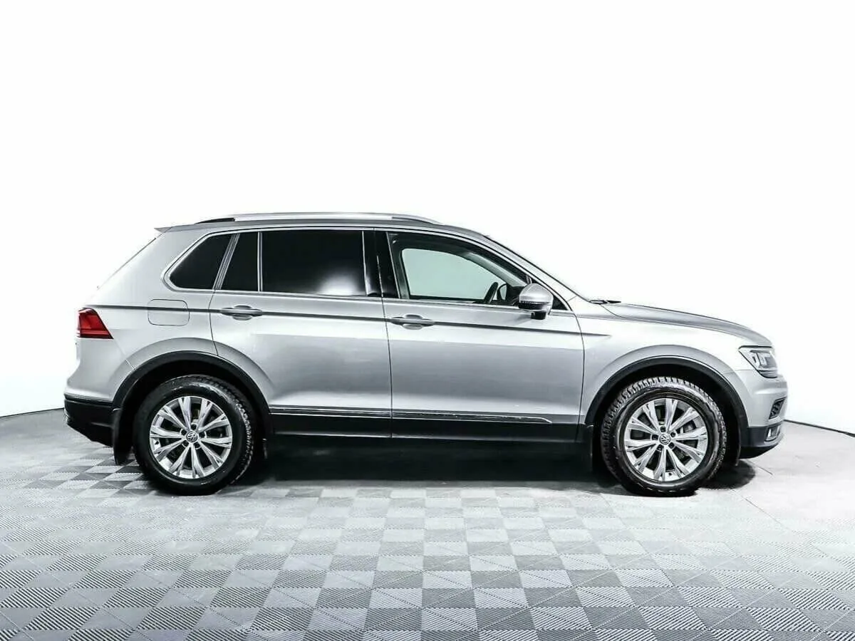 Volkswagen Tiguan II · Highline — фото 3