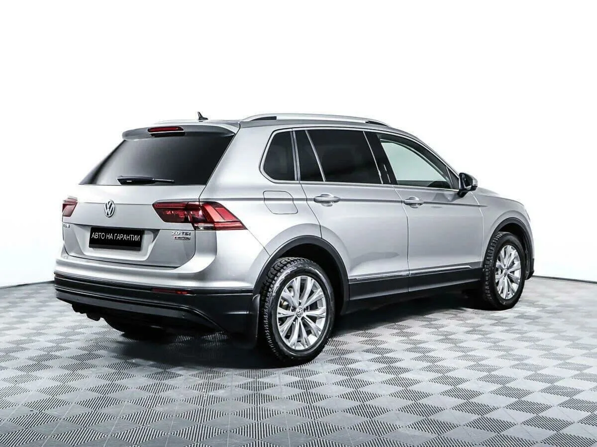 Volkswagen Tiguan II · Highline — фото 4