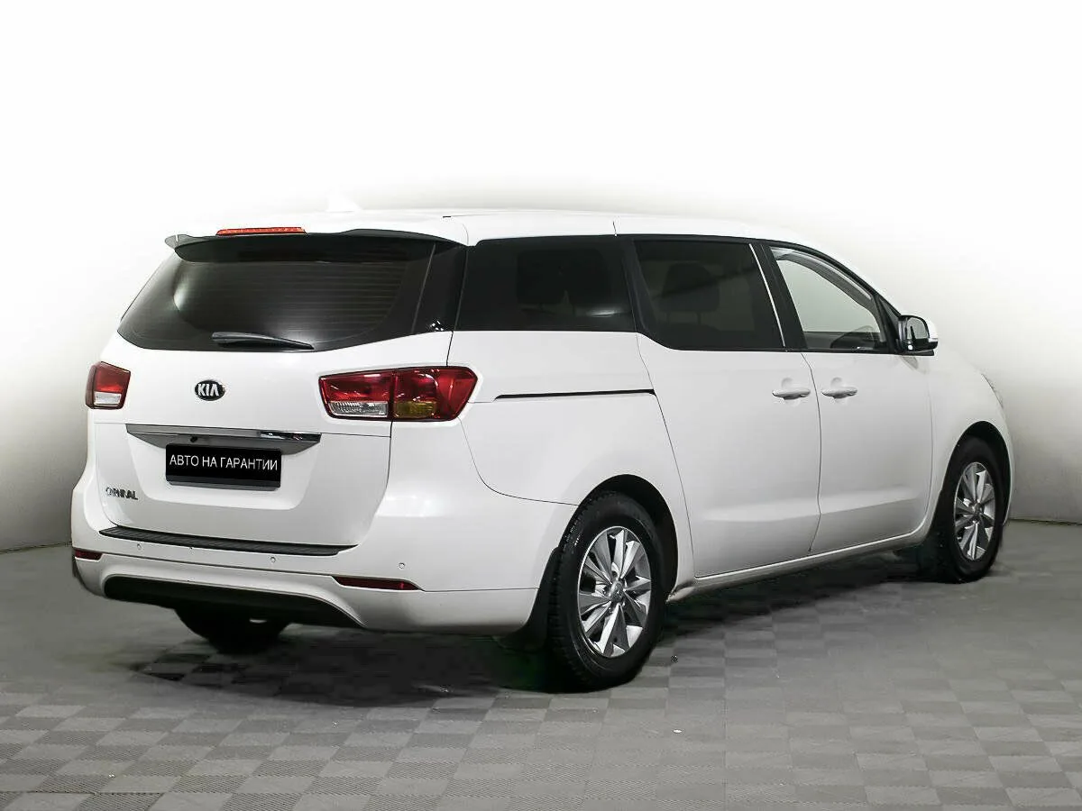 Kia Carnival III — фото 5