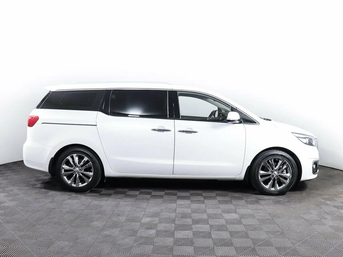 Kia Carnival III — фото 4