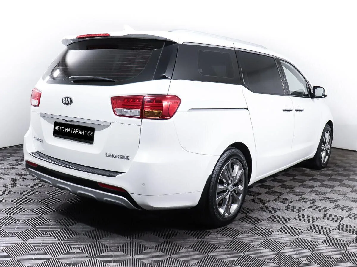 Kia Carnival III — фото 5