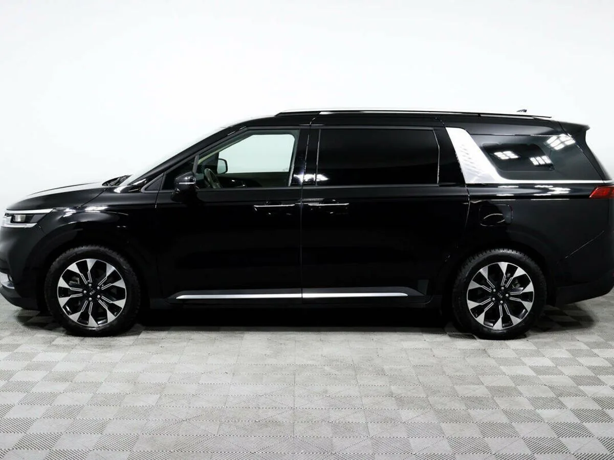 Kia Carnival III — фото 3