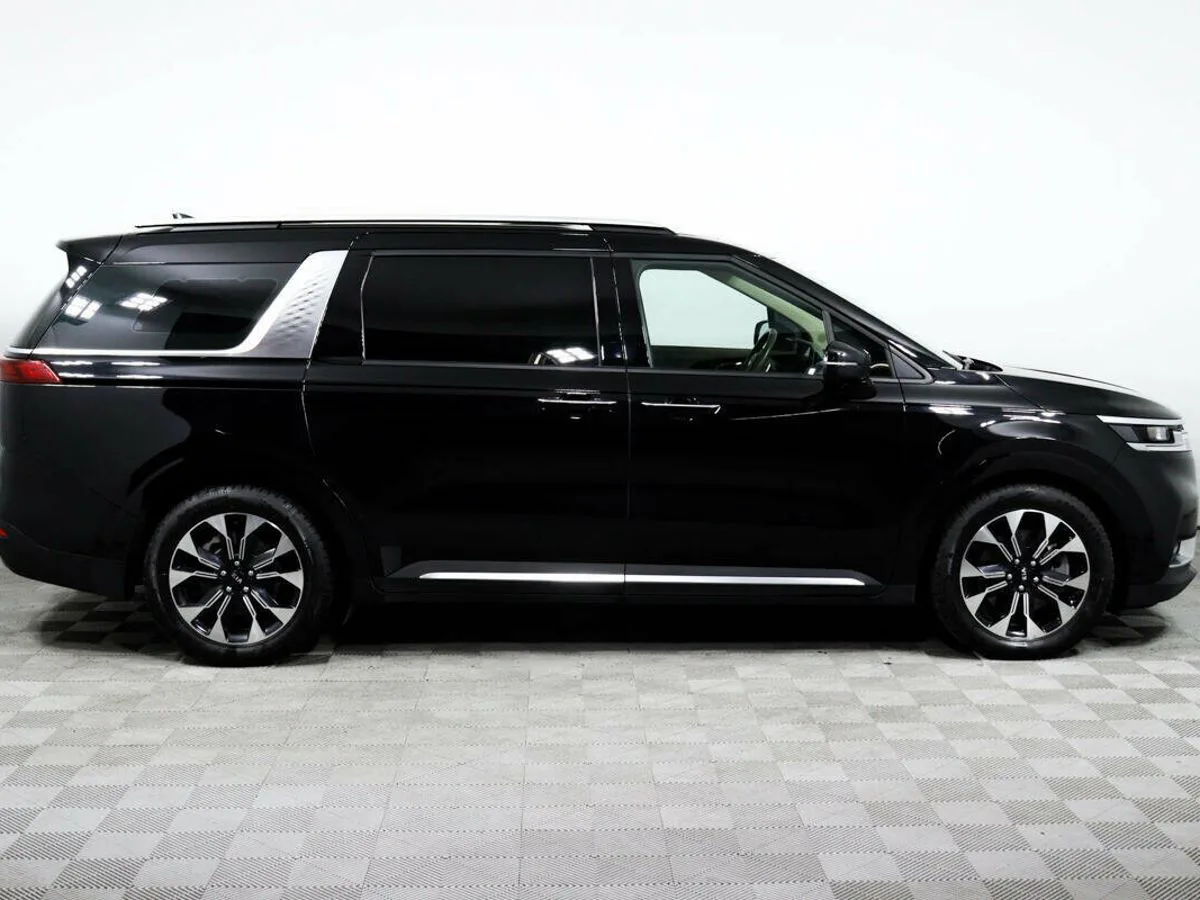 Kia Carnival III — фото 4