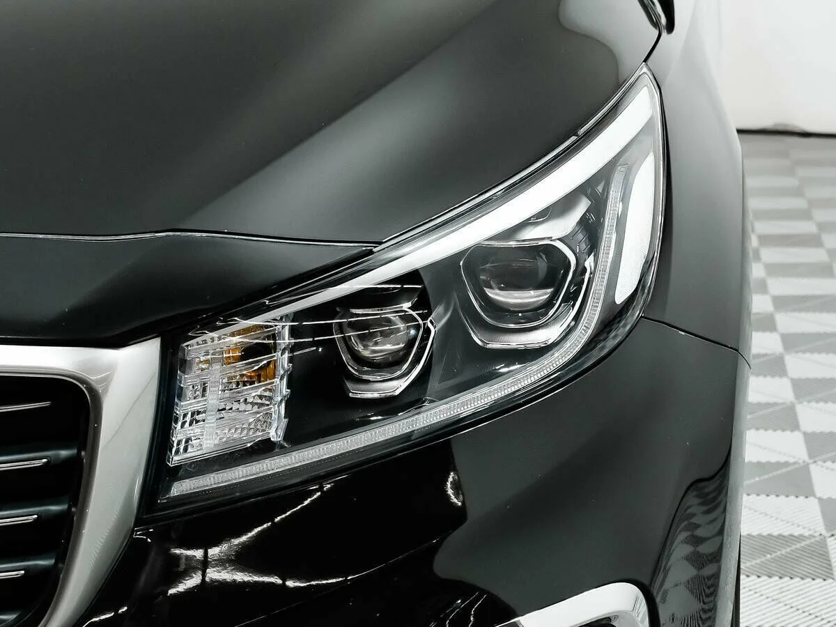 Kia Carnival III — фото 5