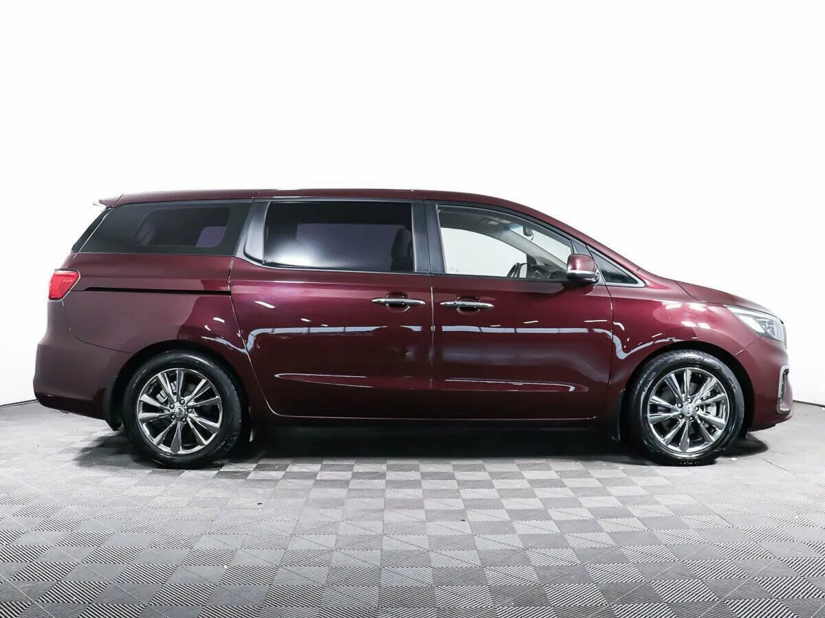 Kia Carnival III — фото 4