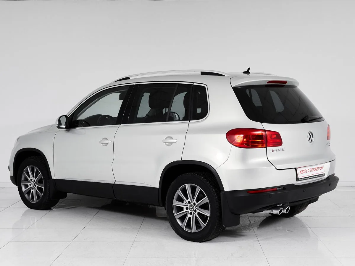 Volkswagen Tiguan I Рестайлинг · Adventure — фото 4