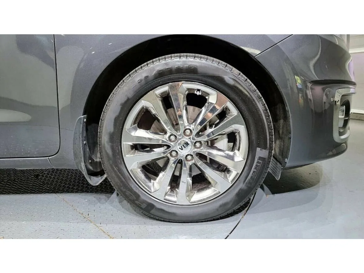 Kia Carnival III — фото 4