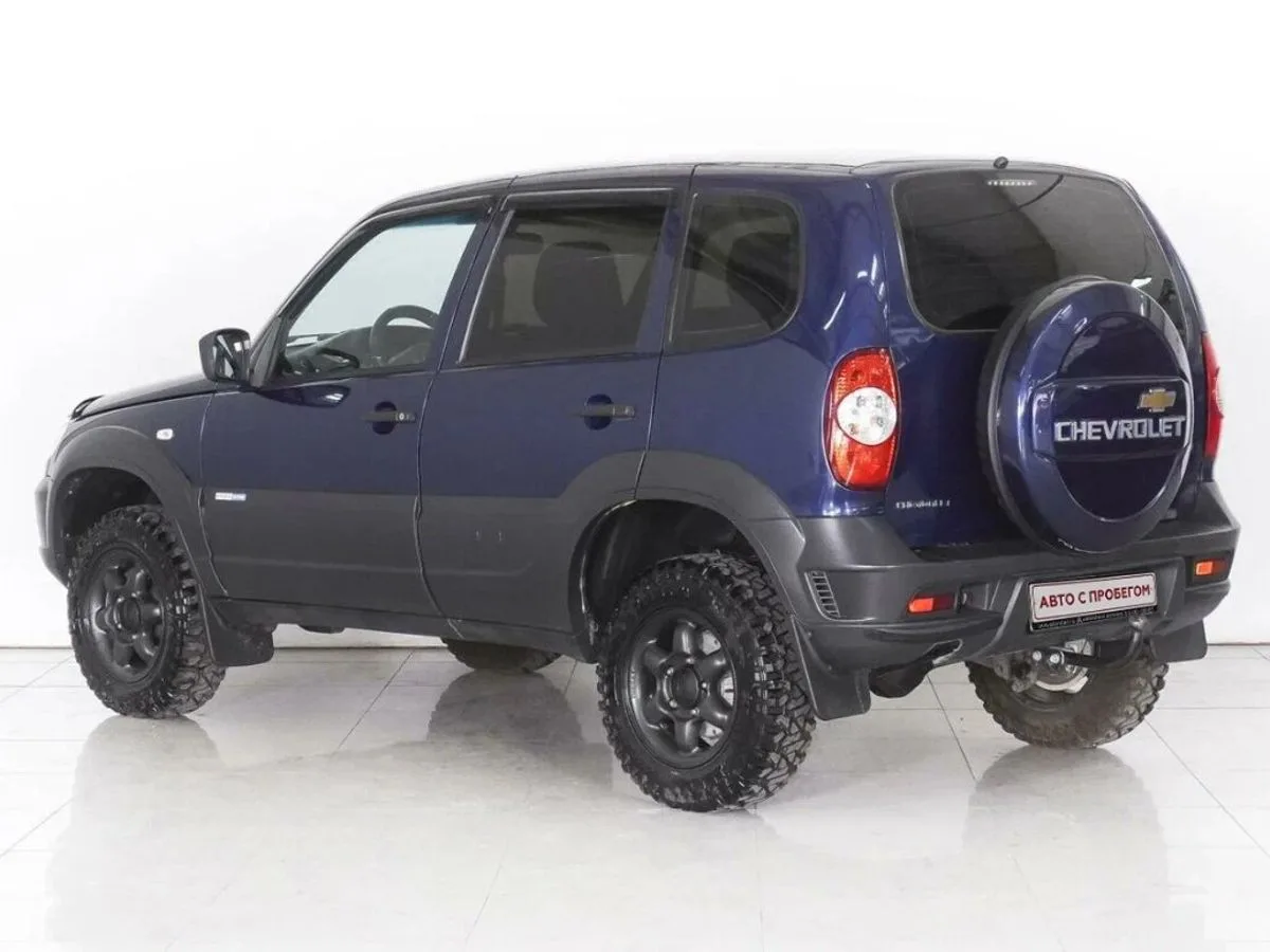 Chevrolet Niva I Рестайлинг · L — фото 2