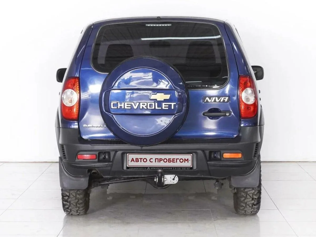 Chevrolet Niva I Рестайлинг · L — фото 4