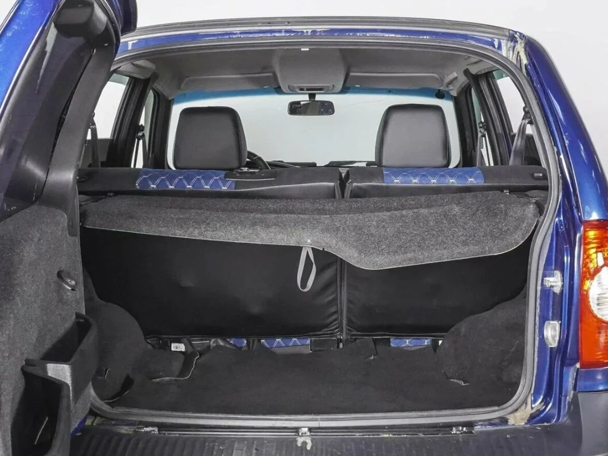 Chevrolet Niva I Рестайлинг · L — фото 5