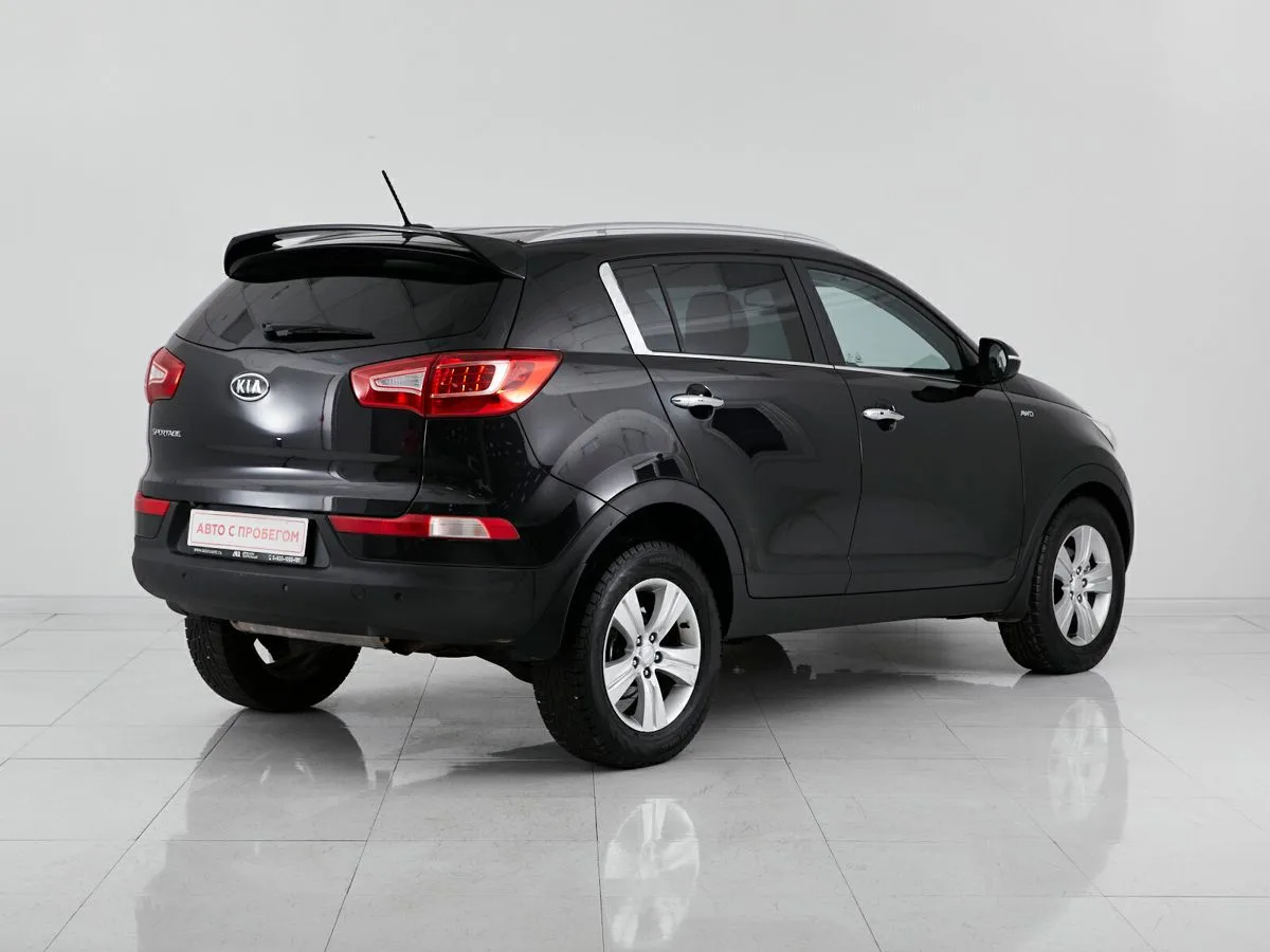 Kia Sportage III — фото 5