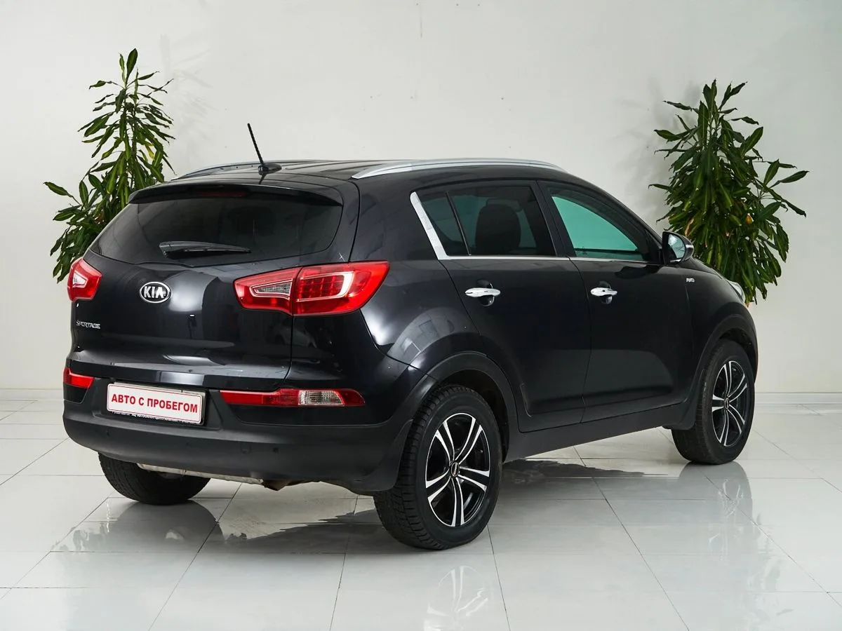 Kia Sportage III — фото 5