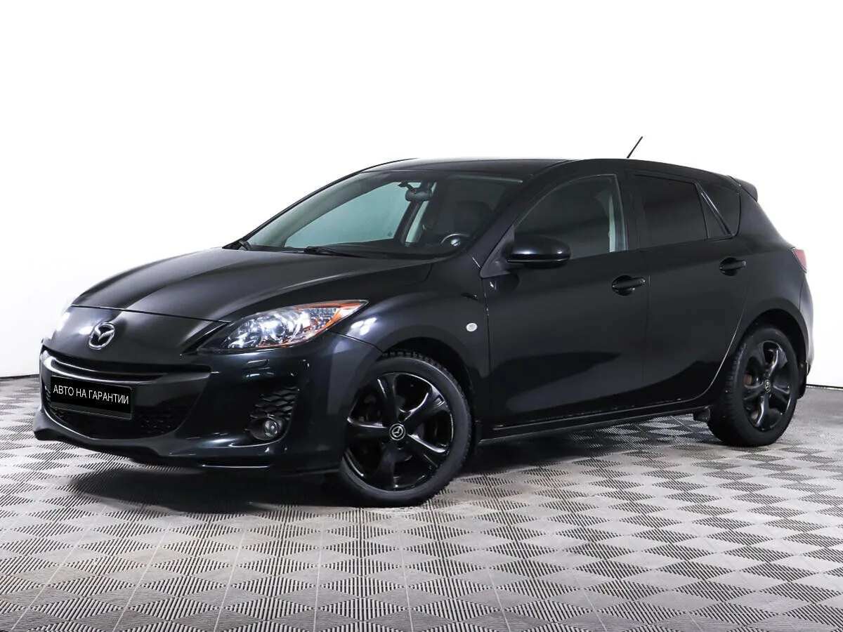 Mazda 3 II (BL) Рестайлинг · Touring Plus