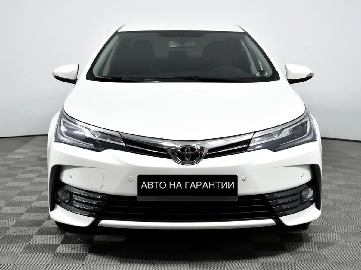 Toyota Corolla XI (E160, E170, E180) Рестайлинг 1 · Стиль — фото 2