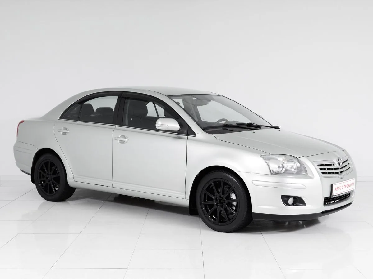 Toyota Avensis II Рестайлинг · Сол — фото 3