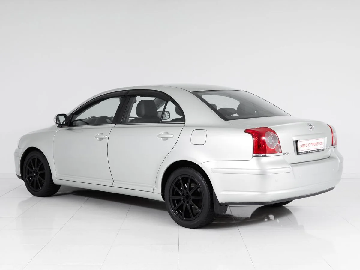 Toyota Avensis II Рестайлинг · Сол — фото 4