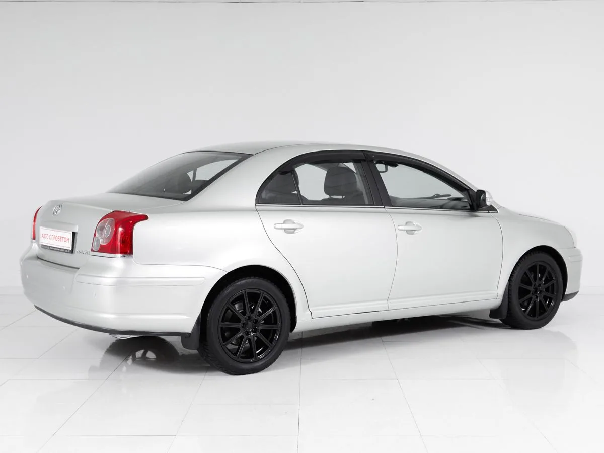 Toyota Avensis II Рестайлинг · Сол — фото 5