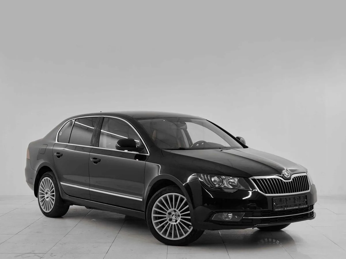 Skoda Superb II Рестайлинг · Laurin&Klement — фото 3