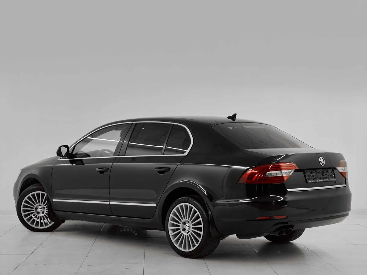 Skoda Superb II Рестайлинг · Laurin&Klement — фото 4