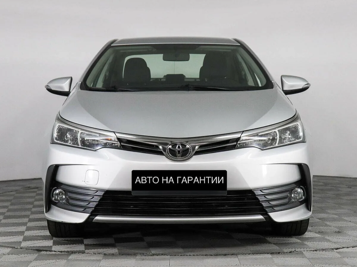 Toyota Corolla XI (E160, E170, E180) Рестайлинг 1 · Стиль — фото 2